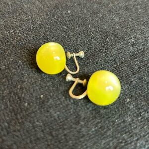 Yellow globe clip-on earrings, reminiscent of a lemon drop candy!